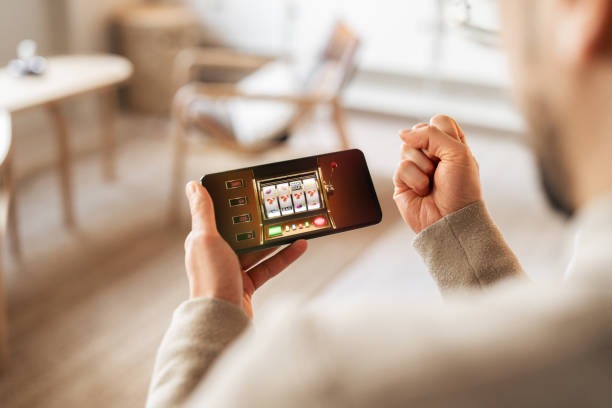 idnscore apk account dashboard showing Andar Bahar game selection